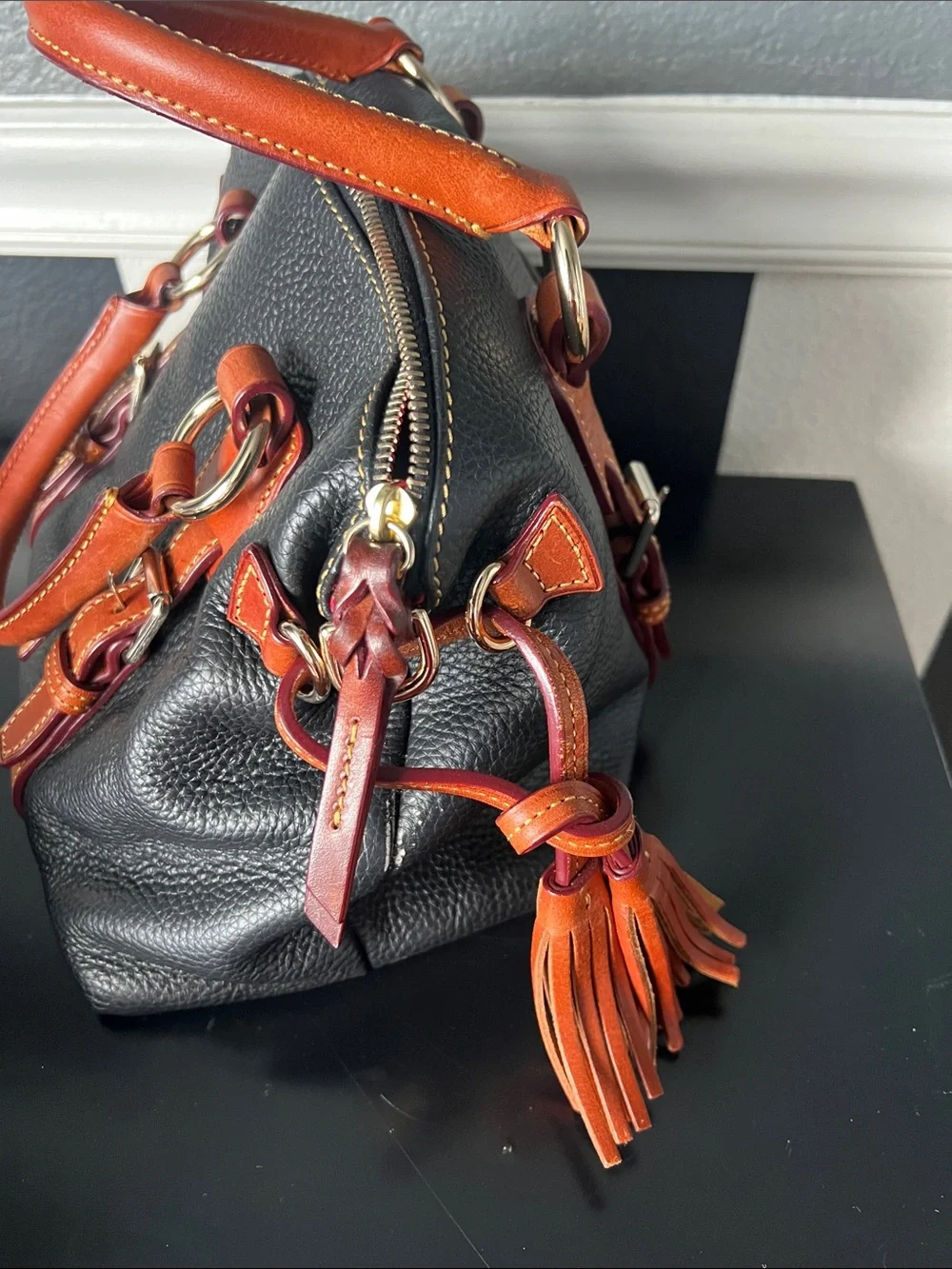 Dooney & Bourke Black Pebbled Leather Satchel with Brown Trim